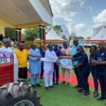 Stanbic Bank Ghana hands over a tractor to MoFA towards the National Farmers Day Celebration