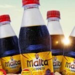 Ghana: Guinness Ghana Breweries Plc Outdoors Clear Malta Guinness Bottles for its Malt Brand
